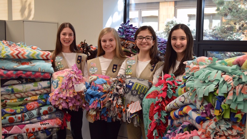 Girl Scouts with their blanket donations