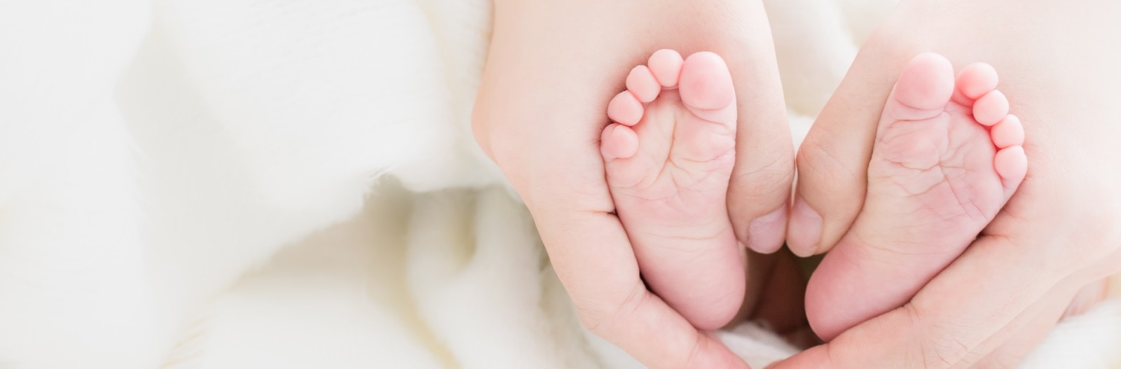 Valley's Center for Childbirth - mother holding baby's feet