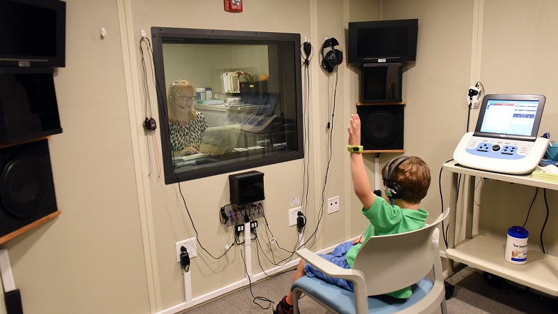 A child undergoing audiology testing at the Kireker Center for Child Development