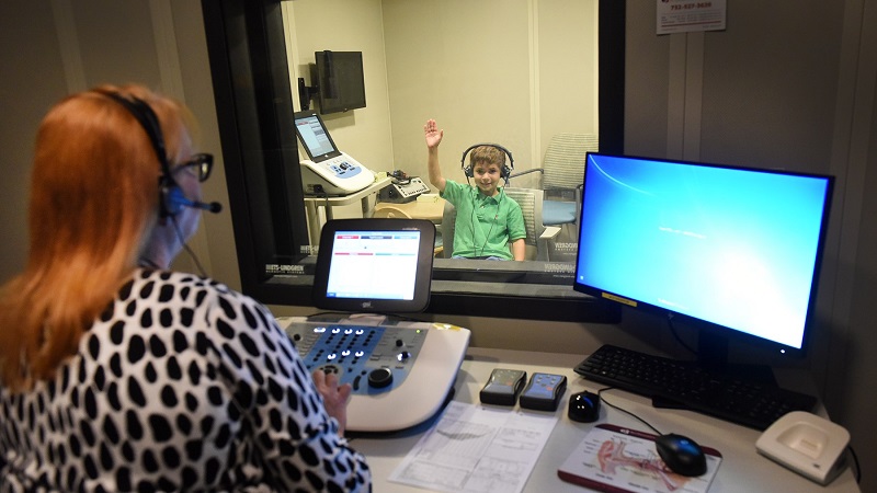 A child undergoing audiology testing at the Kireker Center for Child Development