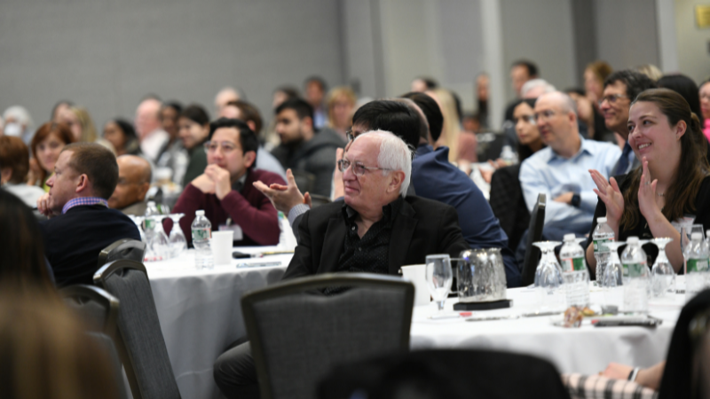 Attendees listening to presentation