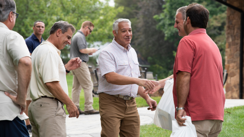 sport clays classic man shaking hand