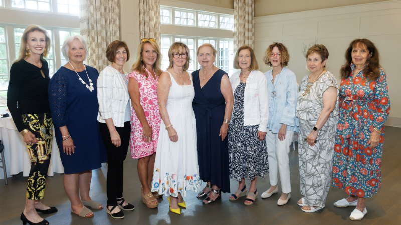 group of women posing for a photo
