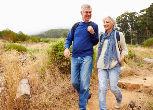man and woman hiking