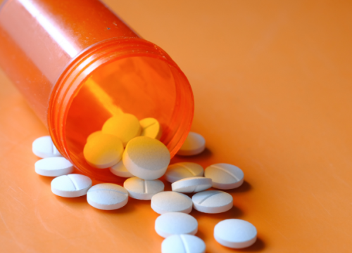 Orange pill bottle with medication