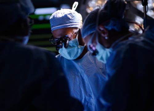 doctor performing interventional cardiology procedure