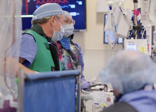 doctors performing transcatheter edge to edge repair procedure