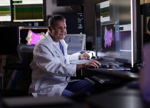 dr mittal looking at patient cardiac images