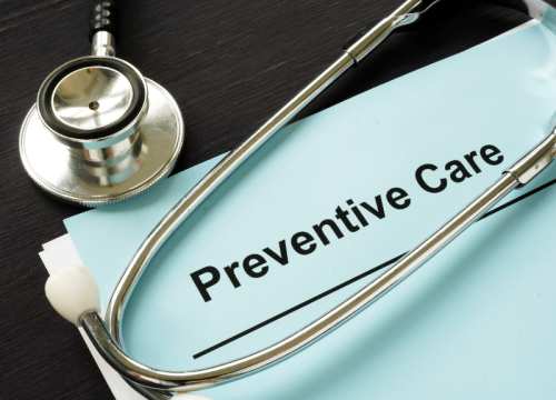 Stethoscope and medical chart with the words "Preventive Care" at the top
