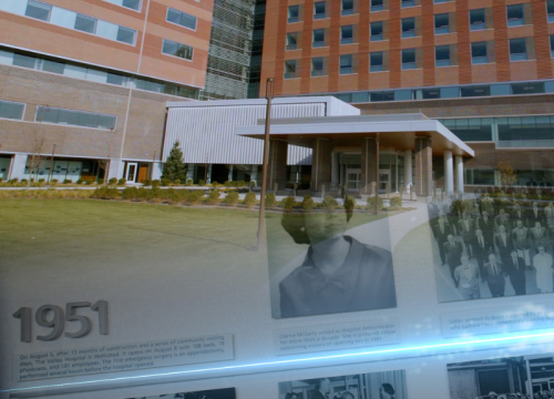 photo of The Valley Hospital exterior and the historical timeline