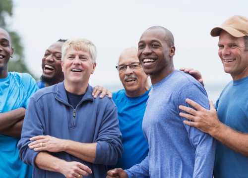 group of healthy, diverse men smiling