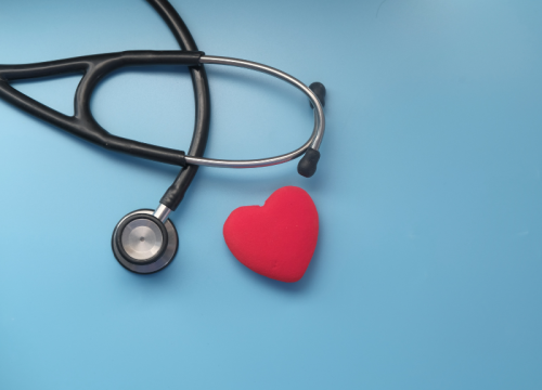 heart next to a stethoscope