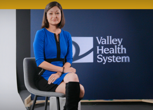 Irene Rossmer, MD, sitting being interviewed