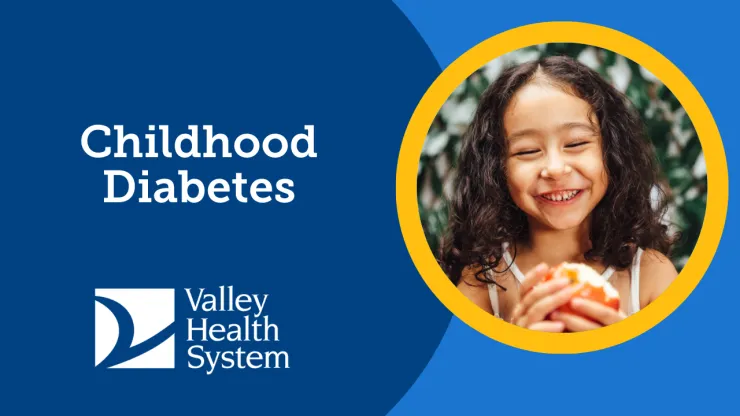 smiling girl eating apple