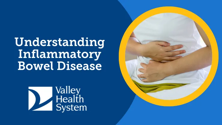 photo of woman holding her stomach in discomfort