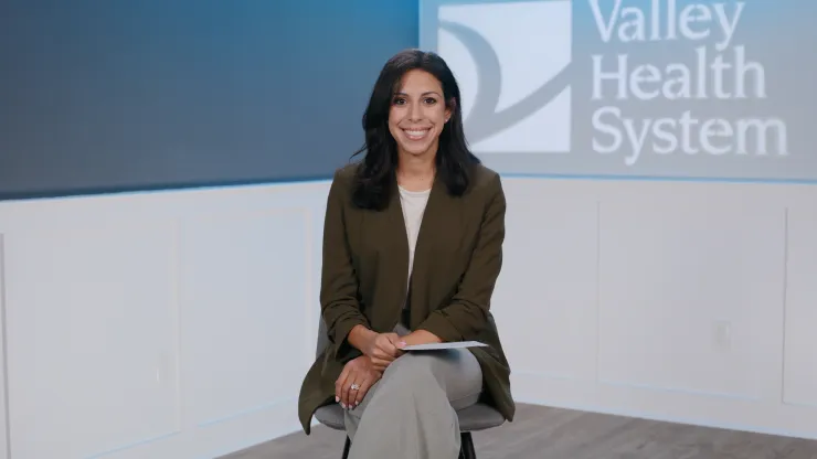 veronica azmy, md, sitting being interviewed