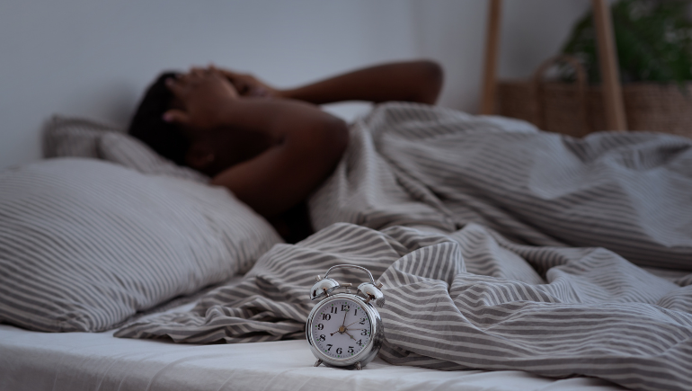 woman having trouble sleeping