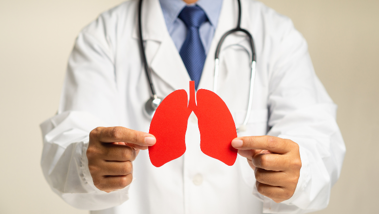 doctor with a picture of lungs
