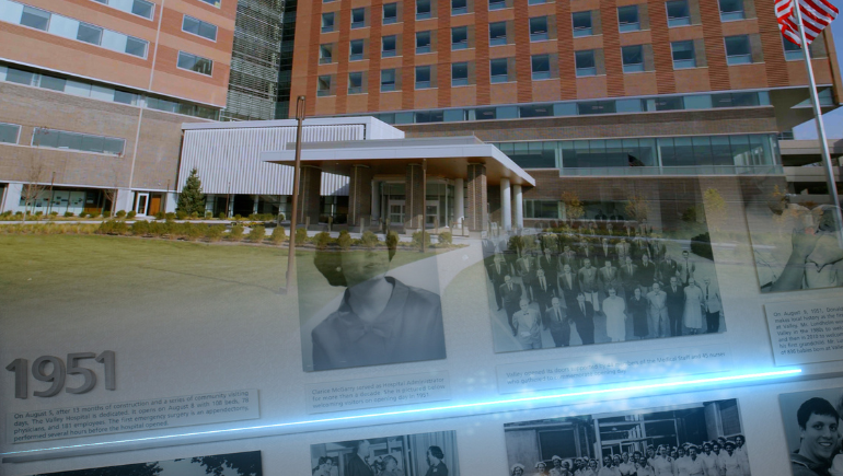 exterior of The Valley Hospital with photos from the 75th Anniversary timeline