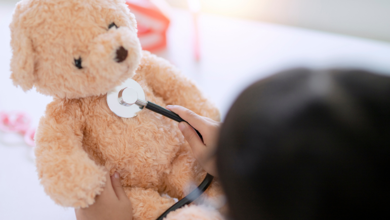 teddy bear getting a check up from a child at the valley health system teddy bear clinic
