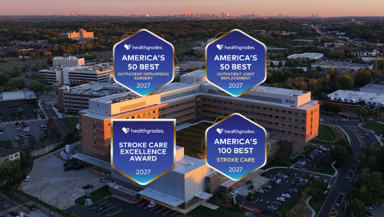 exterior of the valley hospital with healthgrades logos overlaid on top of the image
