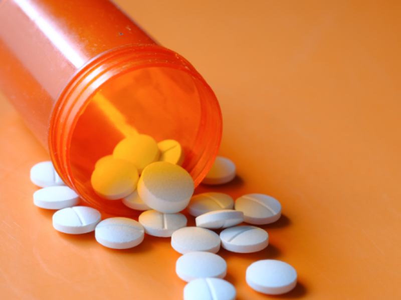 Orange pill bottle with medication