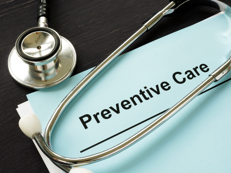 Stethoscope and medical chart with the words "Preventive Care" at the top