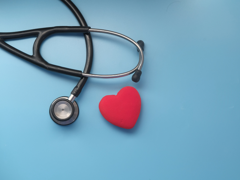 heart next to a stethoscope